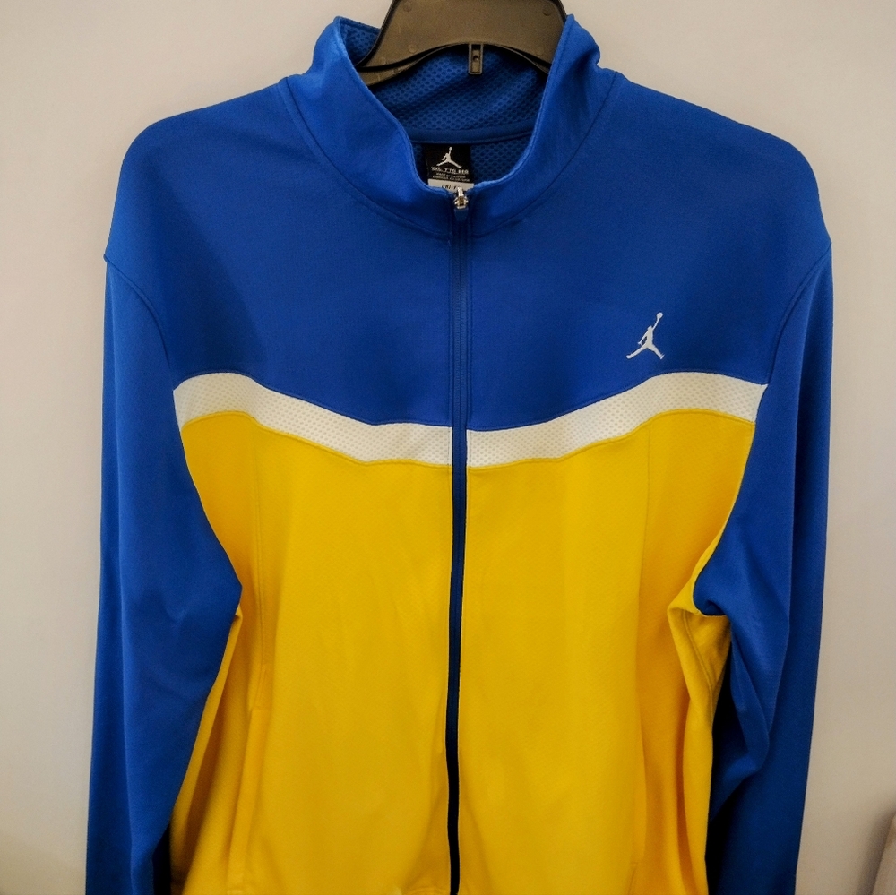 Mens Jordan full zip up athletic jacket in blue and yellow. Size 2xl or XXL.